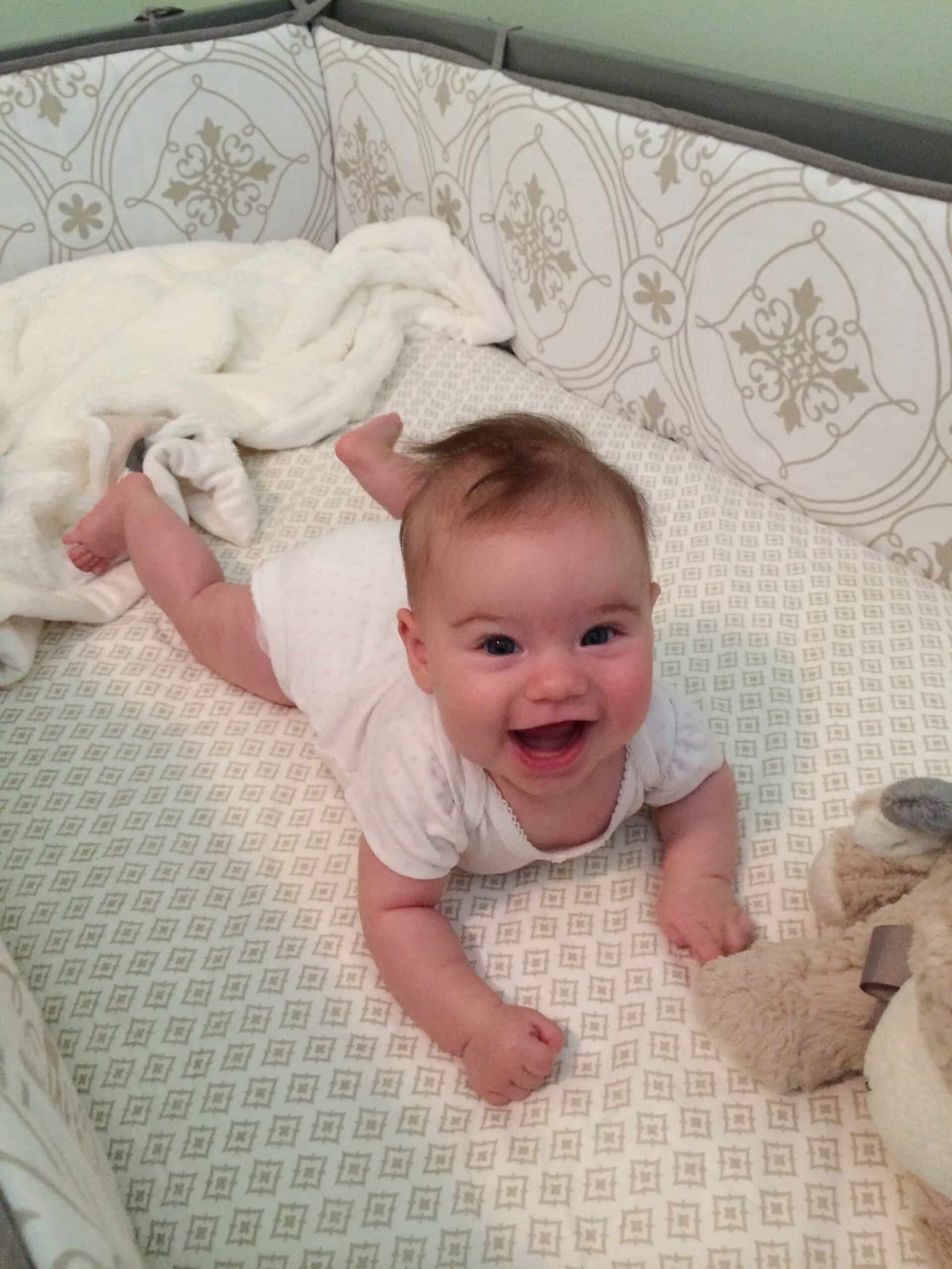 baby learns to roll from back to front