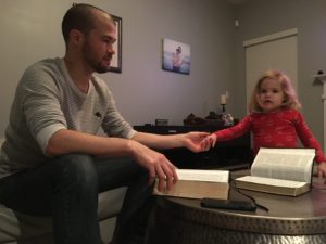 Indie & Daddy reading the Bible