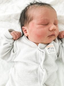 close up of Hadarah sleeping, shortly after her water birth