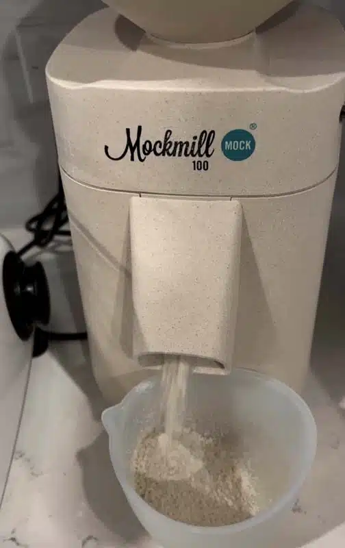 mockmill 100 milling grains into flour