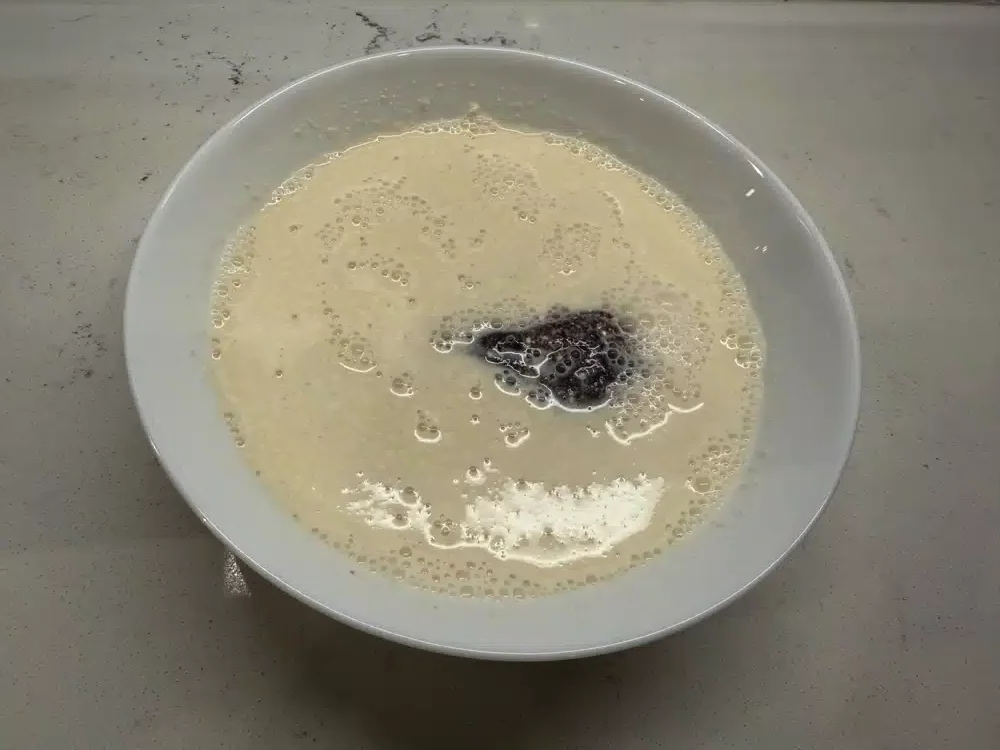 4 oz piece of beef liver soaking in milk